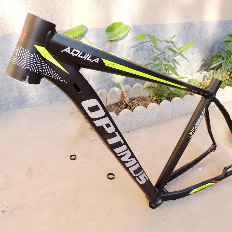 Black-green 29-inch aluminium mountain bike frame with innerline cable routing and disc brake mounts.