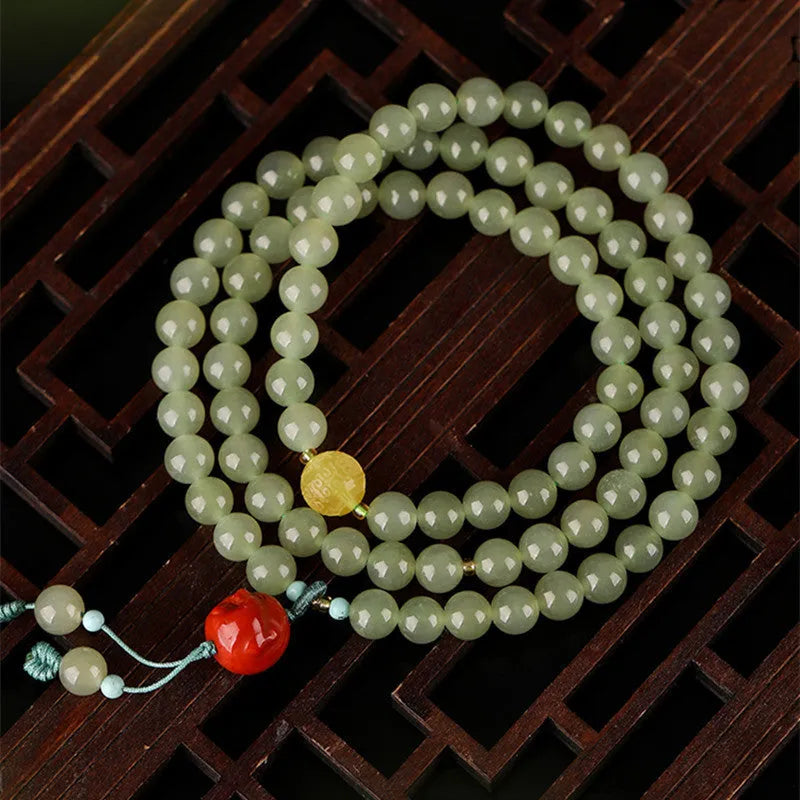 Pale blue Hetian jade bracelet with 6mm beads in three-circle pattern