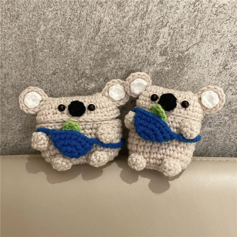 Hand-knitted koala bear backpack design cover for Apple AirPods case.