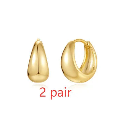 Brass diamond earclip earrings with geometric round design and gold electroplated finish