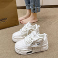Women's casual platform board shoes in white with low heel, lace-up closure, and rubber sole