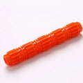 Green and orange durable rubber dog chew toy with treat hole and squeaker for aggressive chewers