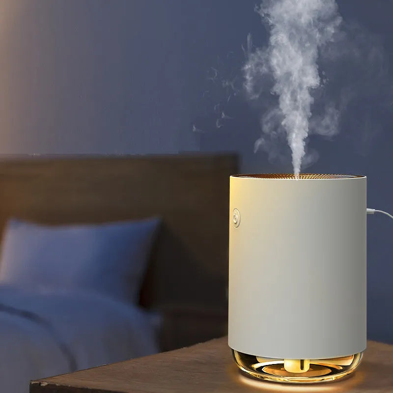 Portable USB humidifier diffuser night light unit in green colour on white surface