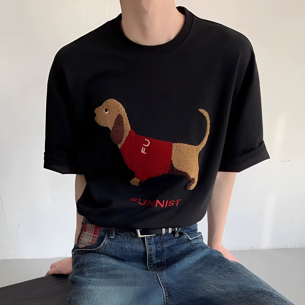Men's grey cotton T-shirt with an embroidered sausage dog on the chest, showing short sleeves and a round neck.