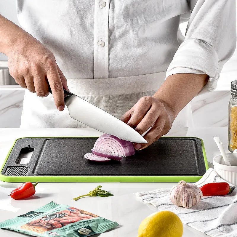 Grey square aluminium cutting board with double-sided design and integrated knife sharpener