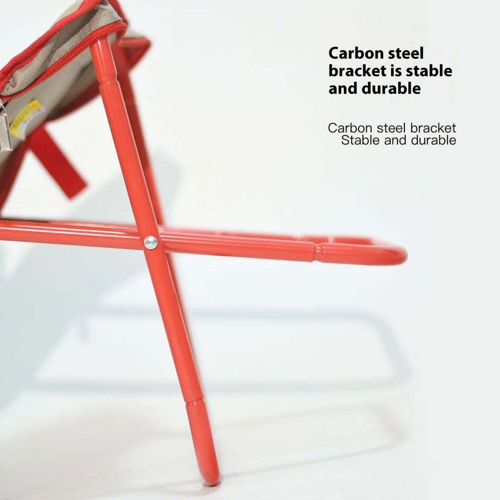 A foldable camp stool made from oxford cloth, shown in a khaki colour, folded into its compact pencil box shape.
