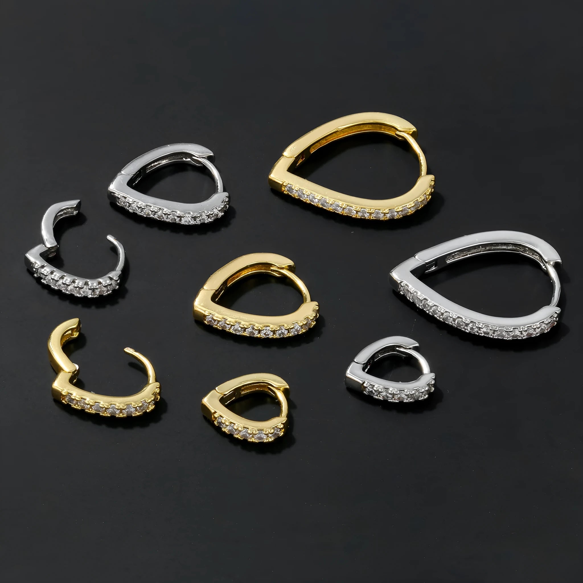 Gold and white geometric heart-shaped copper ear clip for women.
