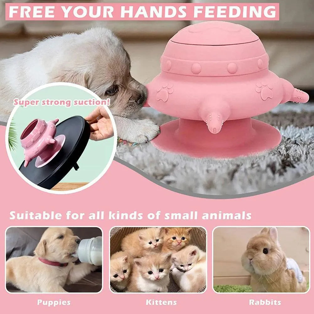 Pink silicone pet nursing bottle with four teats and a flat base.
