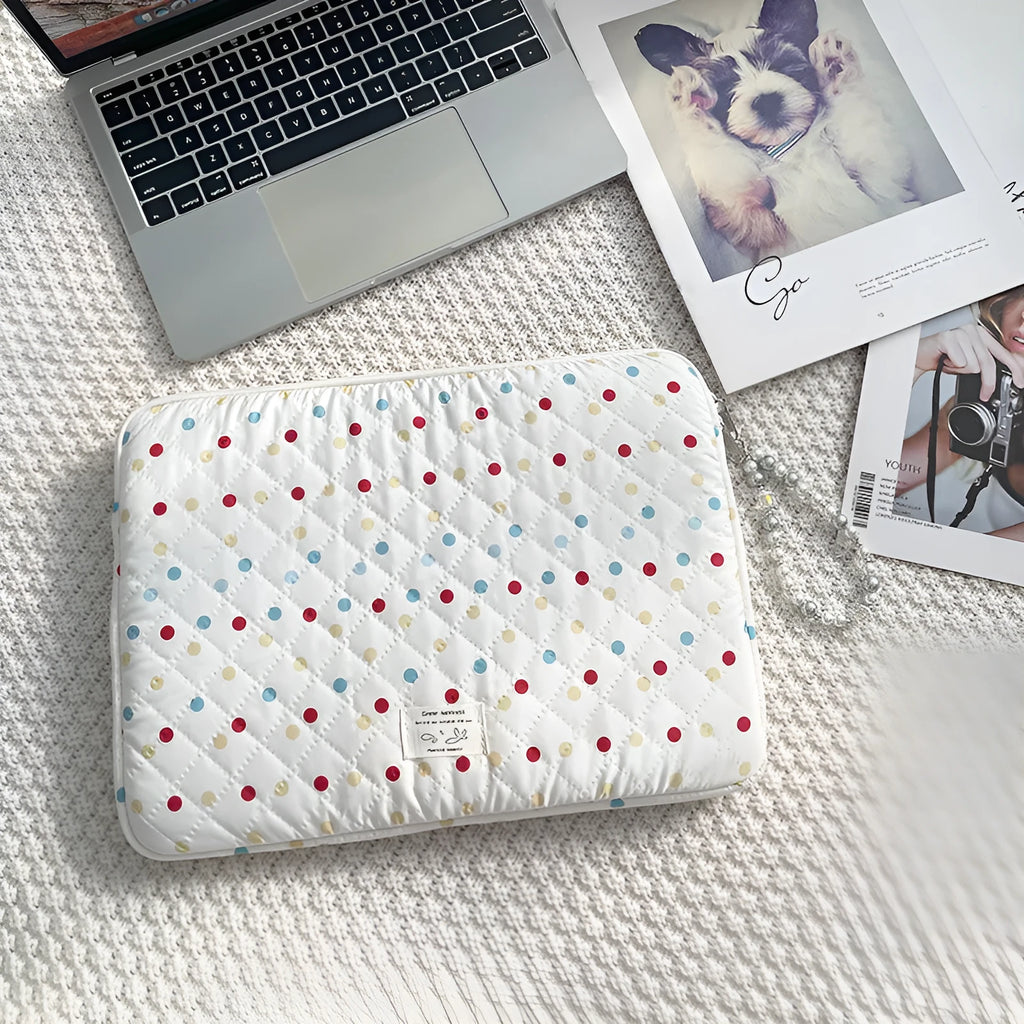 Women's polka dot laptop bag in solid colour with size options for 11, 13, and 15.6 inch computers.