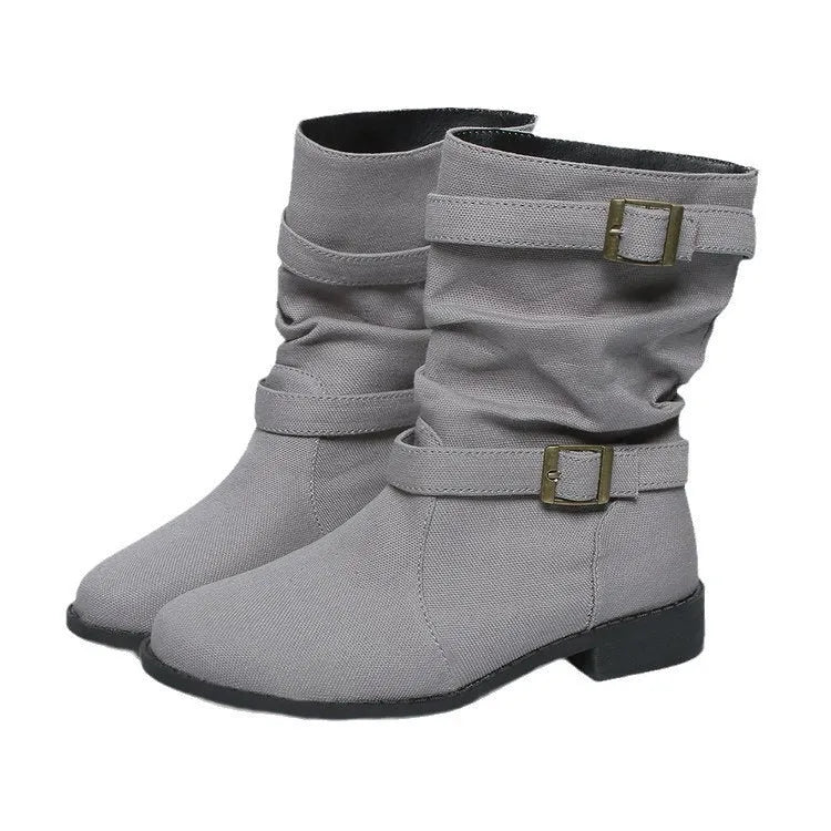 Square heel round toe women's boots in brown artificial PU with leather stitching and rubber sole