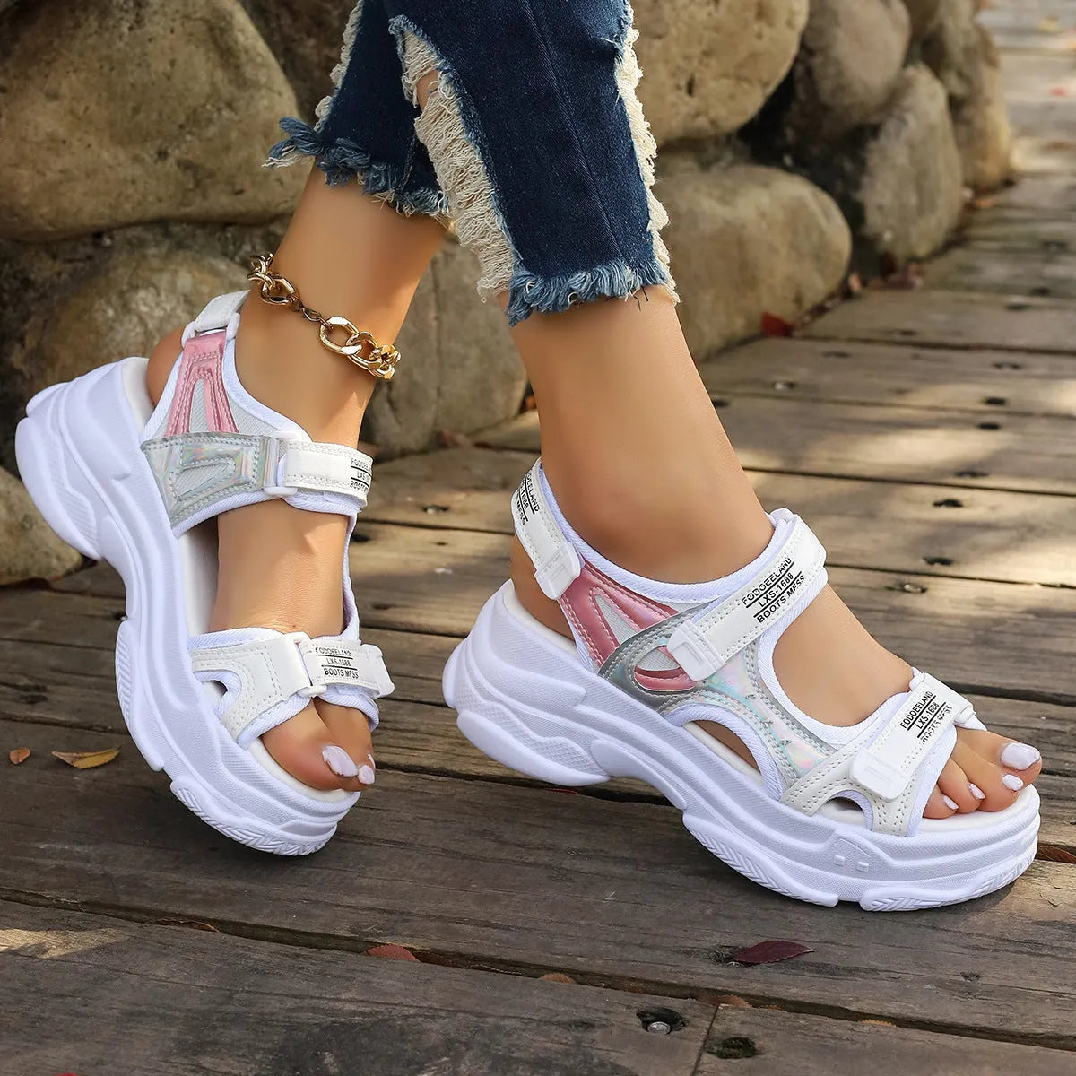 Women's white Roman platform sports sandals with PU upper and rubber sole showing side profile