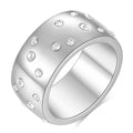 Geometric titanium steel couple ring with diamond treatment in rose gold finish on a size chart.