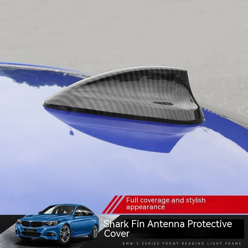 BMW shark fin antenna cover replacement in carbon fibre pattern and piano black finish options.