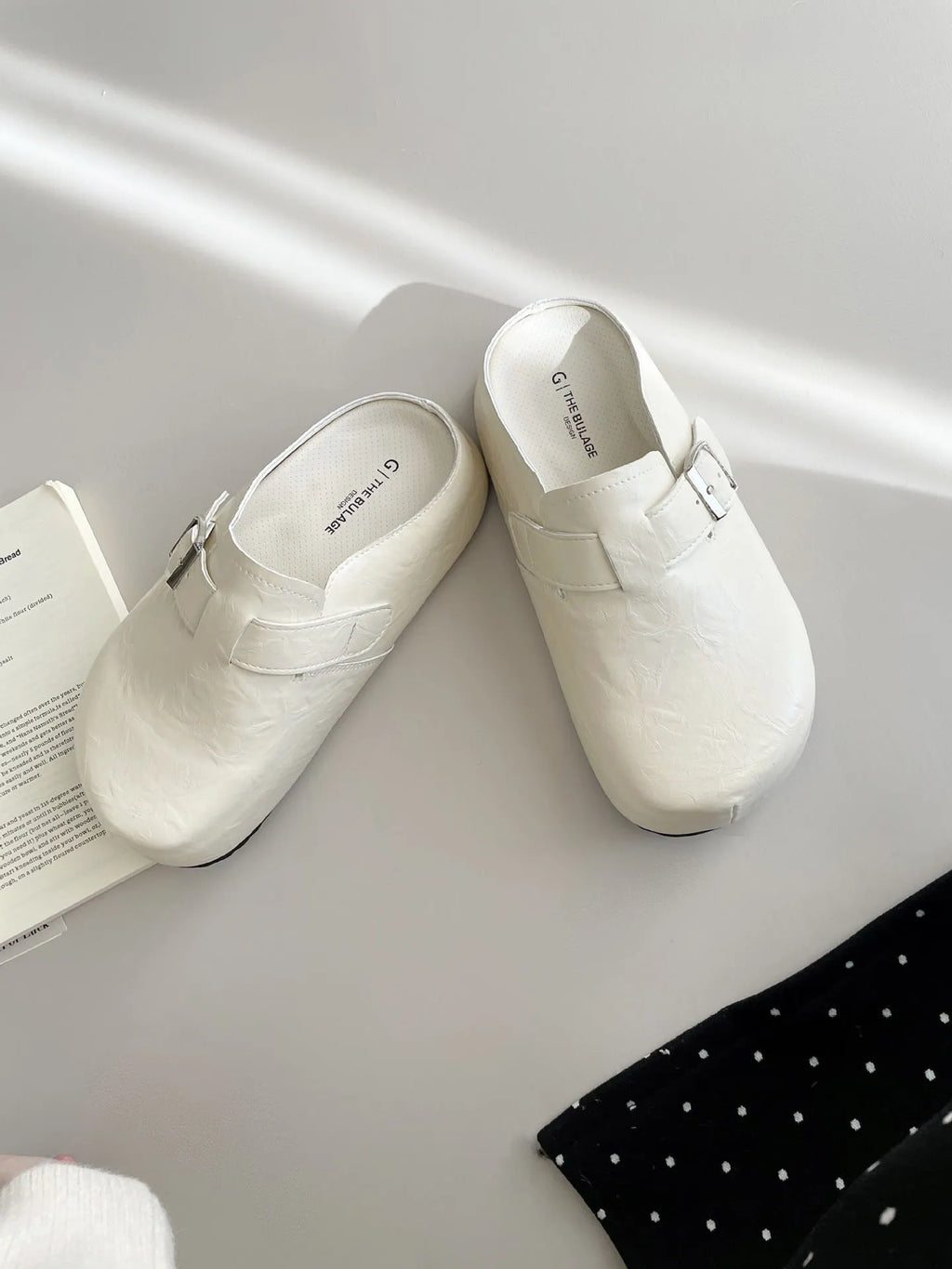 Flat buckle casual sneakers with round toe in yellow, creamy-white, silver, and black colours