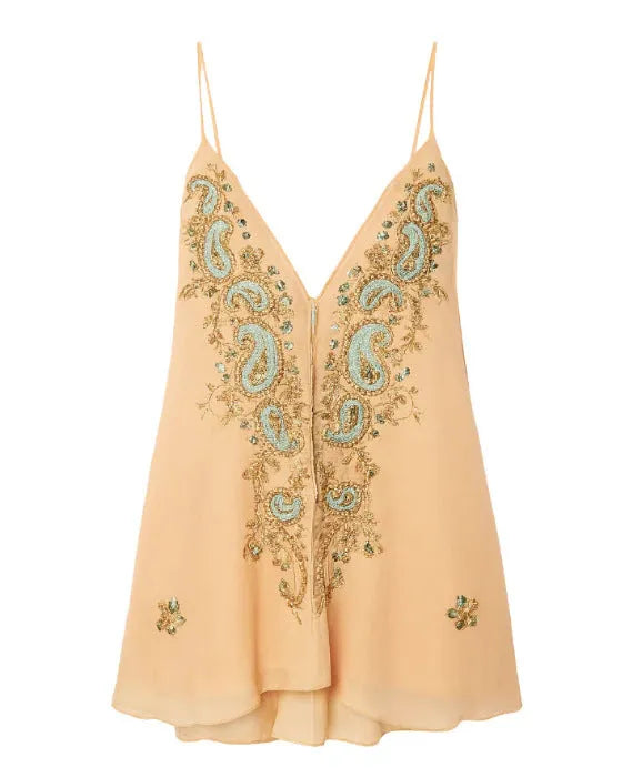 Light yellow women's ethnic print sleeveless skirt with V-neck and sling straps on a mannequin.