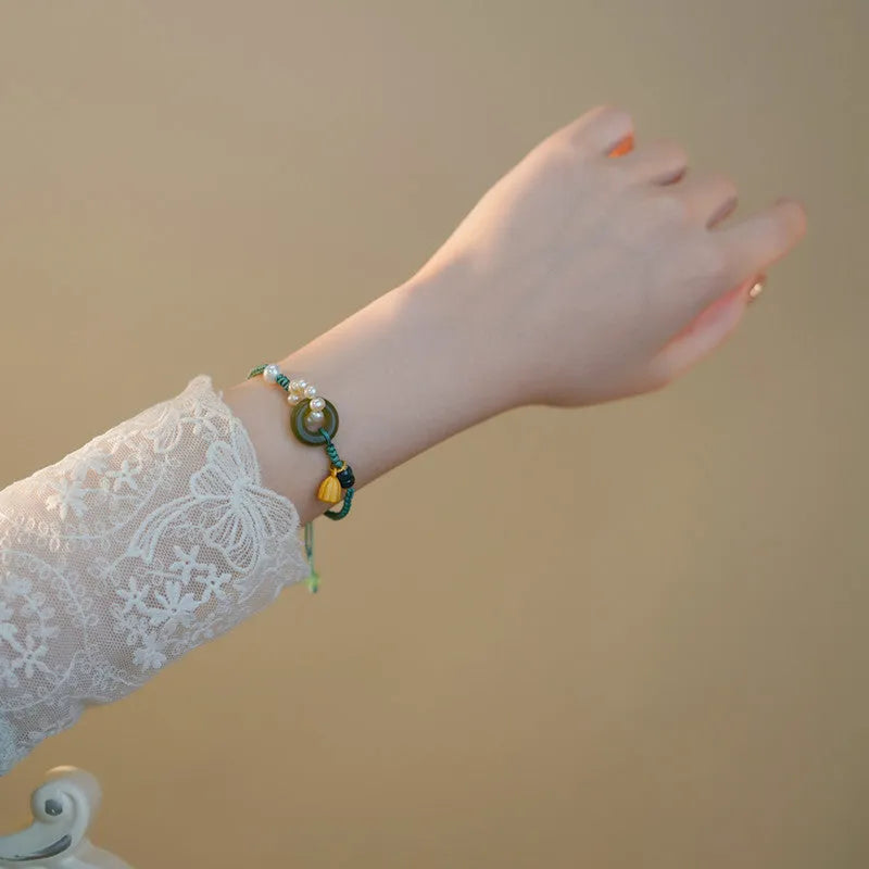 Hand-woven flexible wire watch band with Pearl Peace Buckle and round jade pearl decoration