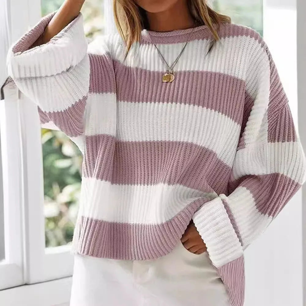 Women's striped loose sweater with bell sleeves and crocheted flower details in viscose fibre.