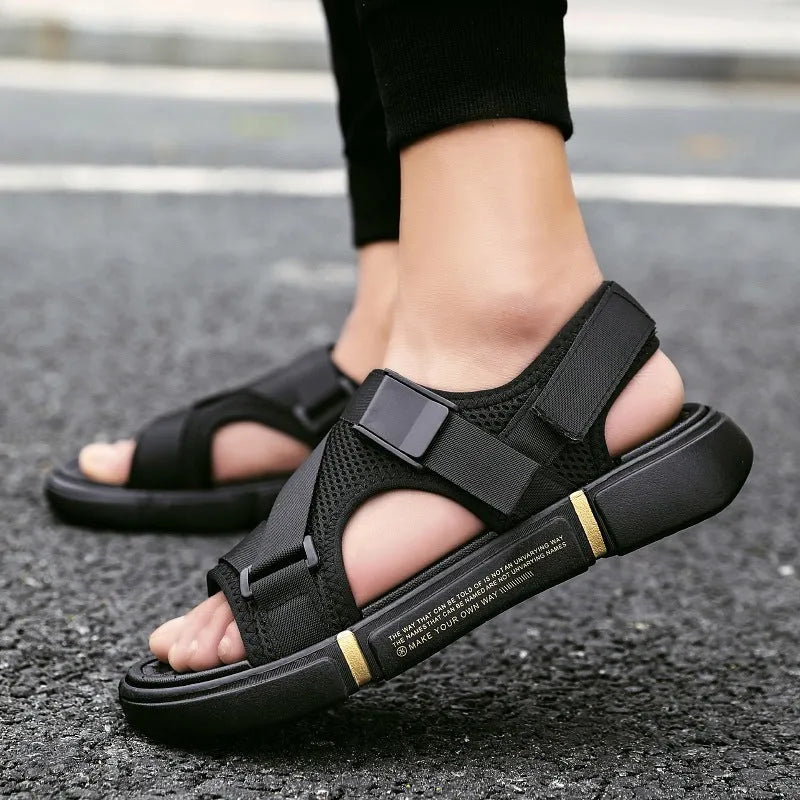 Men's black Velcro open toe beach sandals on a light surface, sizes 39-44