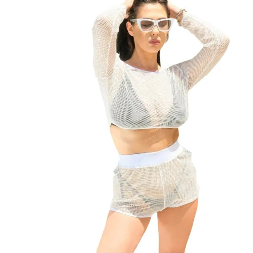 White transparent women's beach swimsuit set with a bikini top and skirt on a mannequin.