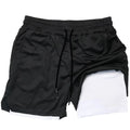 Men's camouflage pattern double-layer sports shorts in quick-dry fabric on a plain background.