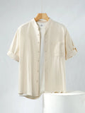 Men's loose short sleeve linen shirt in cotton blend with stand collar.