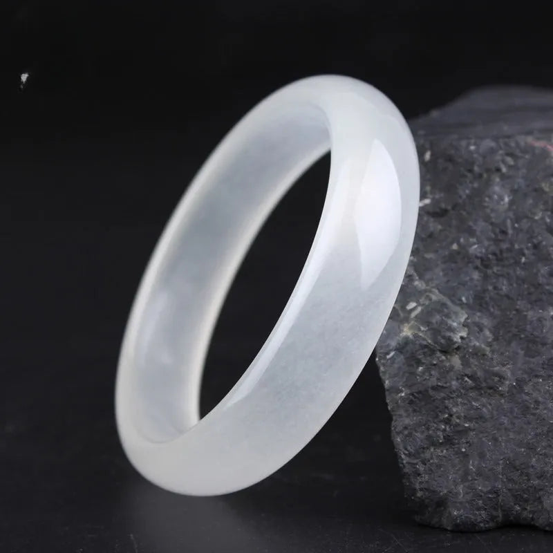 Gao Bing jade bracelet in white moonlight colour on a wrist, showing flat and round bar shape options.