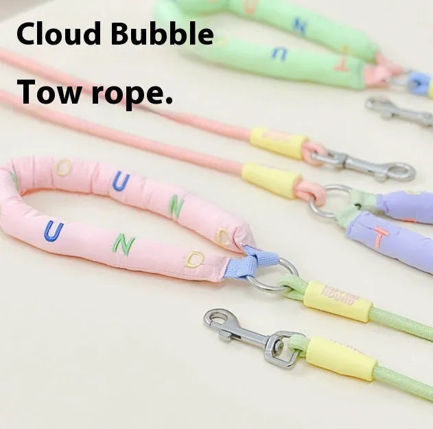 Polyester dog leash in green colour, showing hand holding rope design and clip.