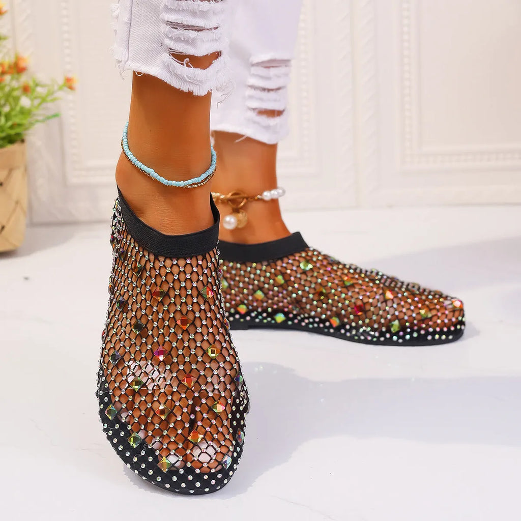 Women's colourful rhinestone mesh flat sandals on white background showing round toe design