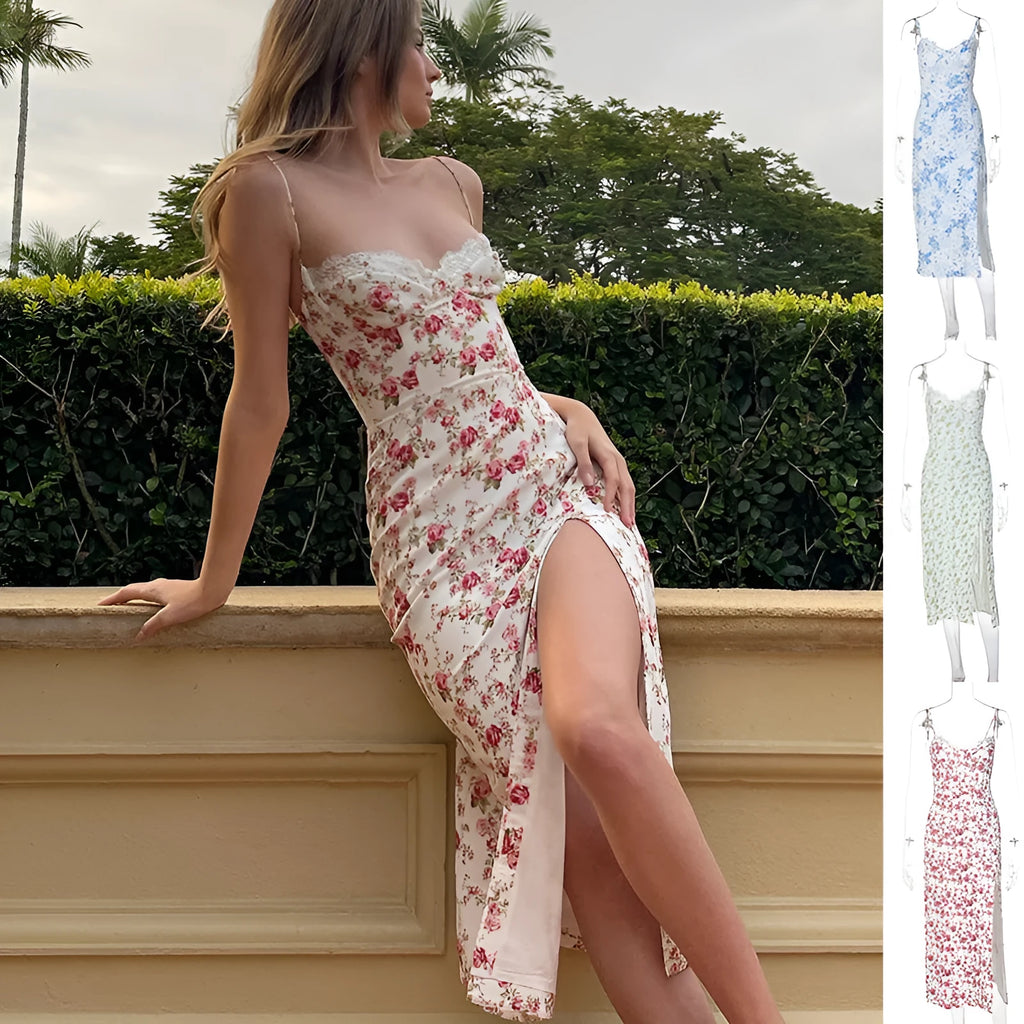 Women's blue lace flowers print long dress with suspender straps and a side slit on a model.