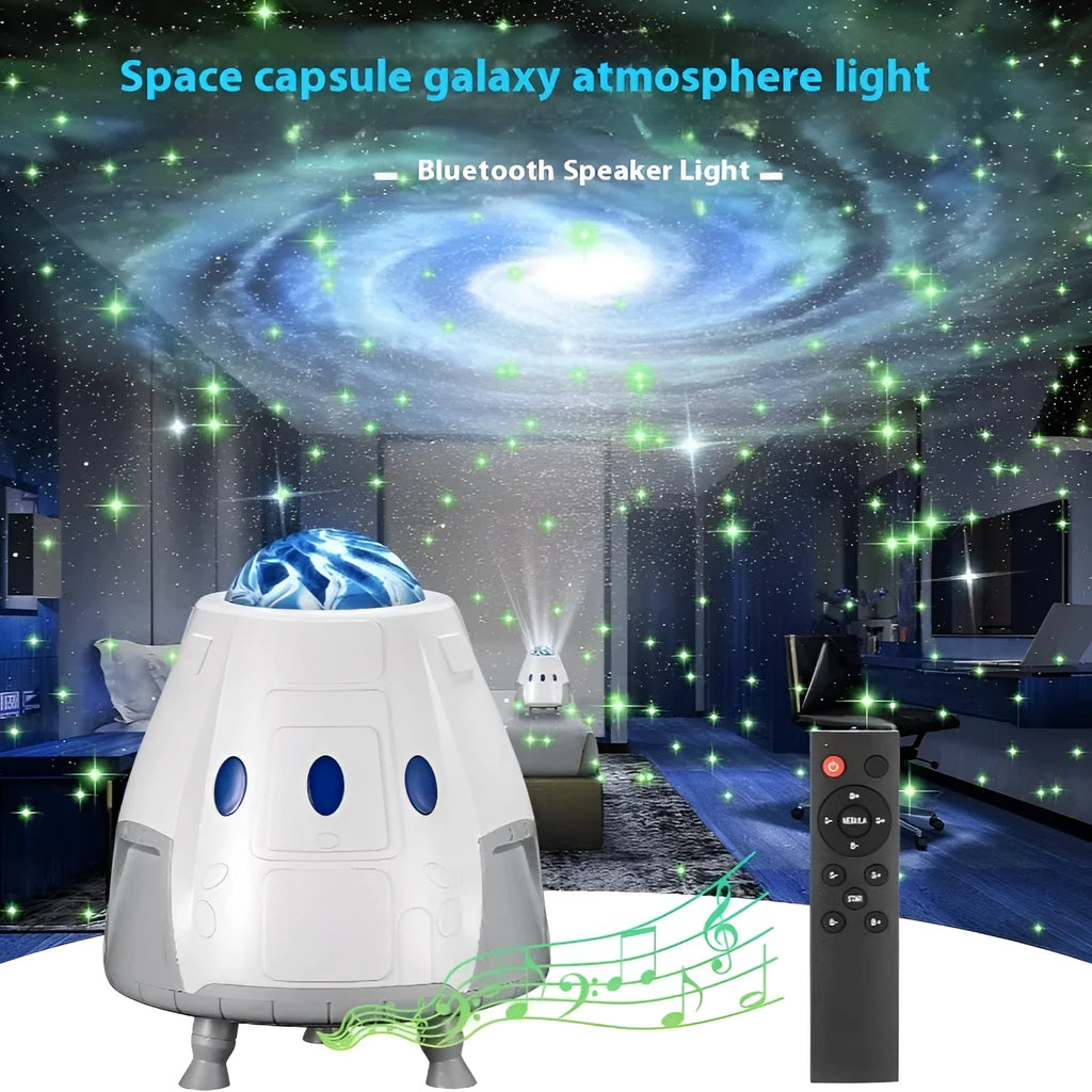 Space capsule shaped USB galaxy projection lamp with remote control on a surface.