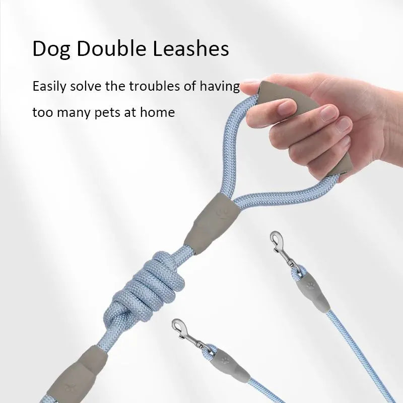 Double dog leash for two dogs with foam handle in blue colour showing metal buckles