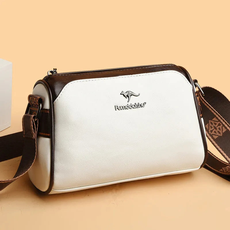Oil wax leather women's crossbody bag with double-sided design and sandwich pocket in beige