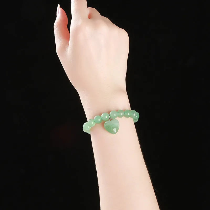 Natural stone love pendant bracelet for women with heart-shaped geometry, in various colours.