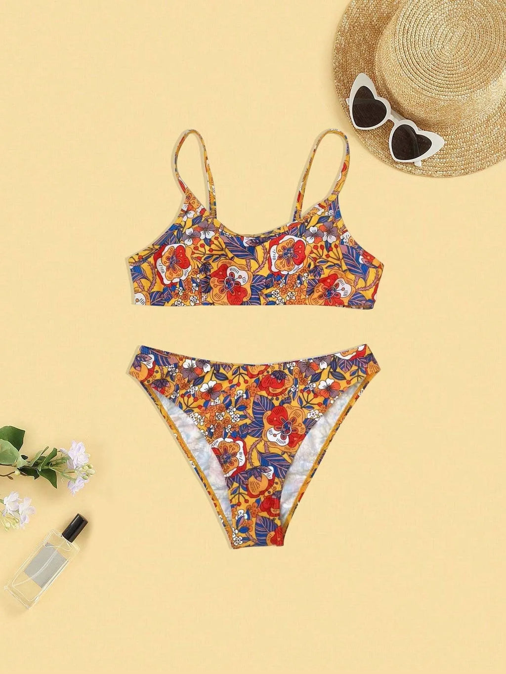 Plus size women's floral print bikini with adjustable straps, two-piece swimsuit set in colourful patterns