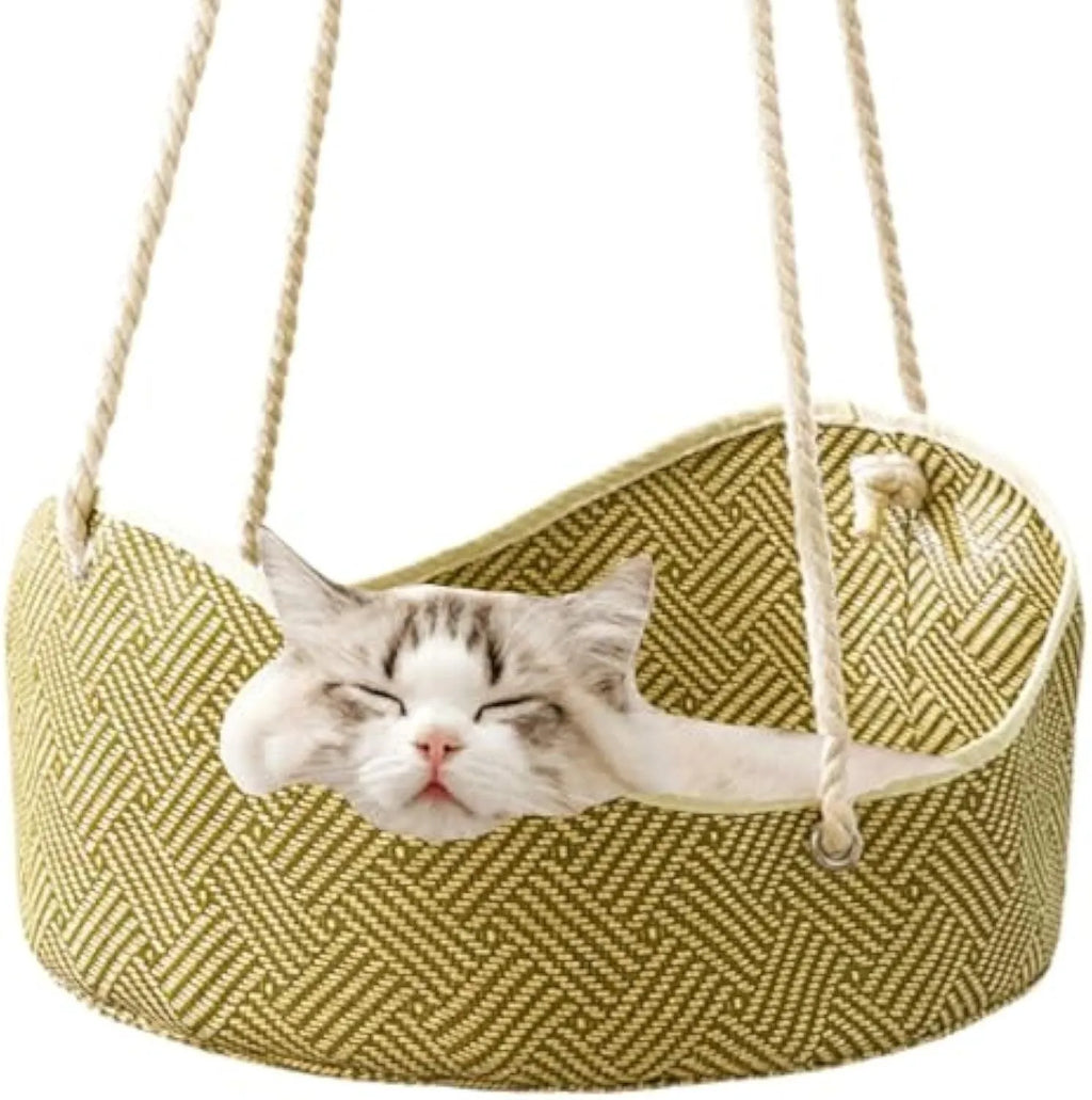 Green rattan cat hammock with cotton ropes and metal hooks, shown hanging