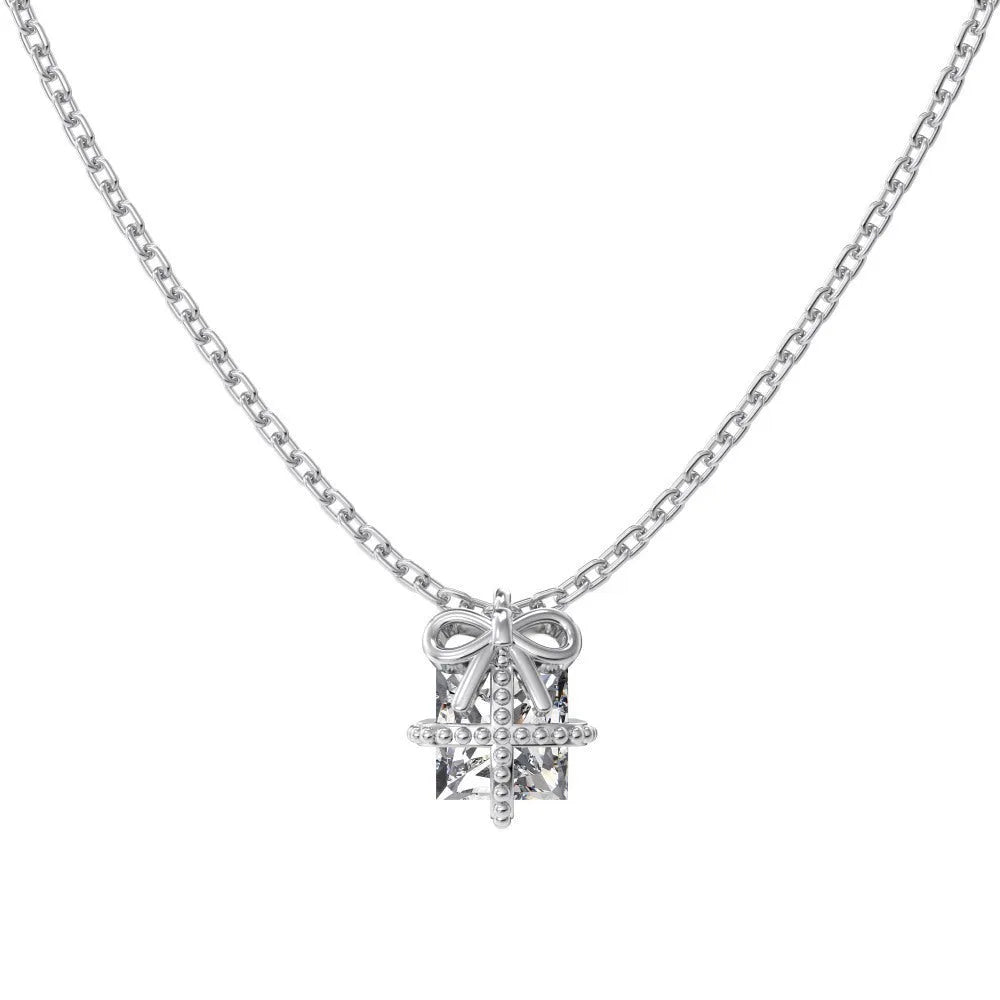 S925 sterling silver necklace and earring set with bear pendant in gold finish on display