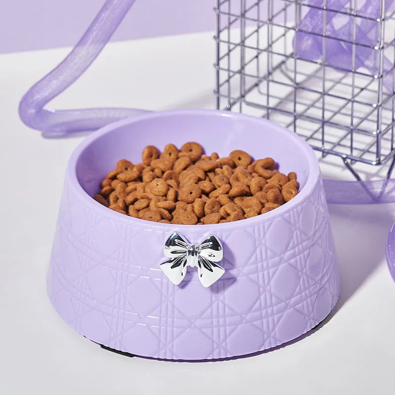 Ceramic pet bowl with diamond pattern and bow design in multiple colour options