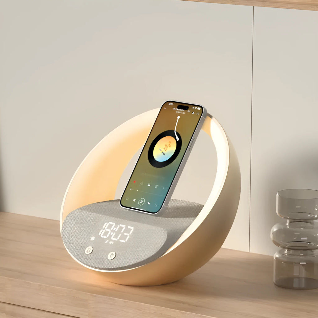 Beige and grey multifunctional wireless charging clock with Bluetooth speaker and LED light display.