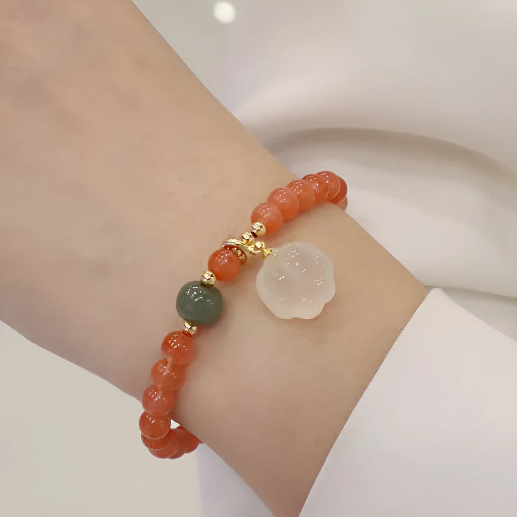 8mm natural red agate bracelet with jade inlay and cat paw animal charm