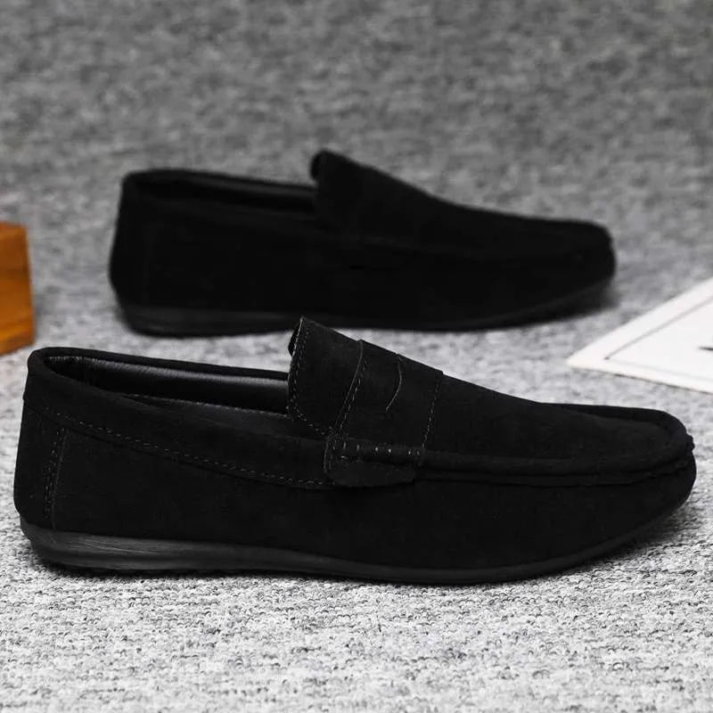 Men's black Gommino Korean fashion slip-on shoes with round toe and rubber sole