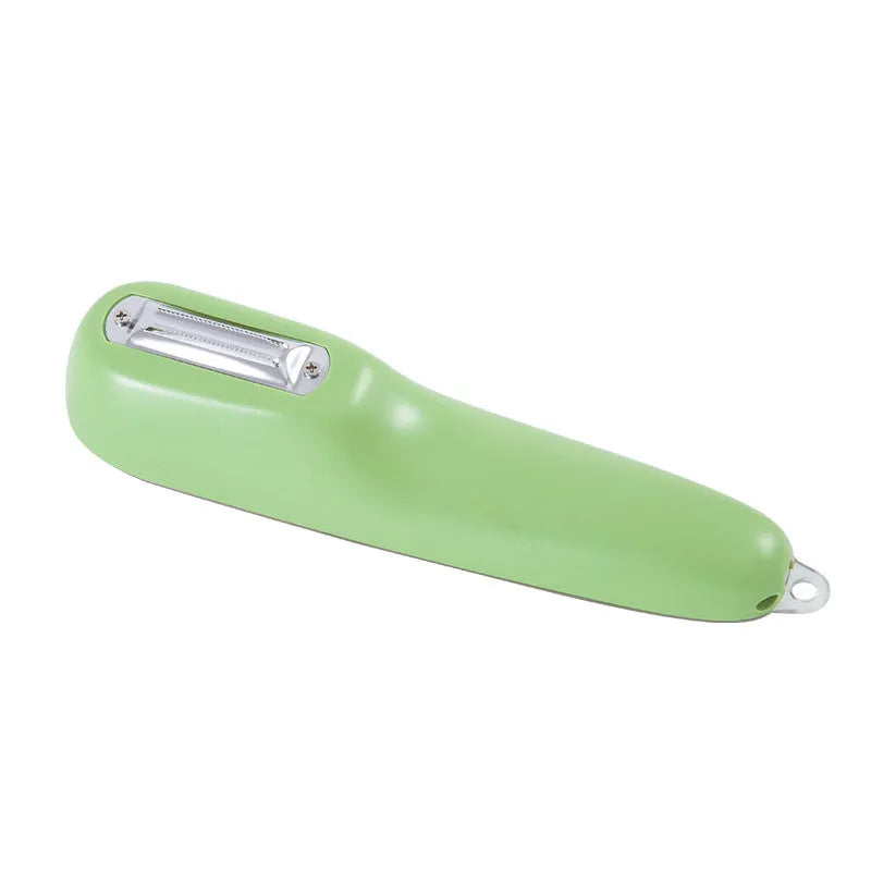 Green plastic handled vegetable peeler stored inside its own clear plastic tube.