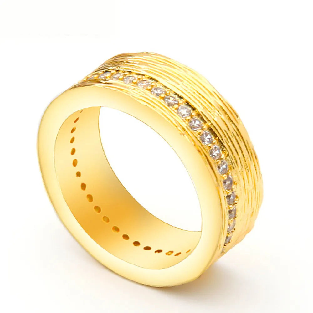 Gold geometric women's zircon ring in electroplated copper, shown in sizes 6-8