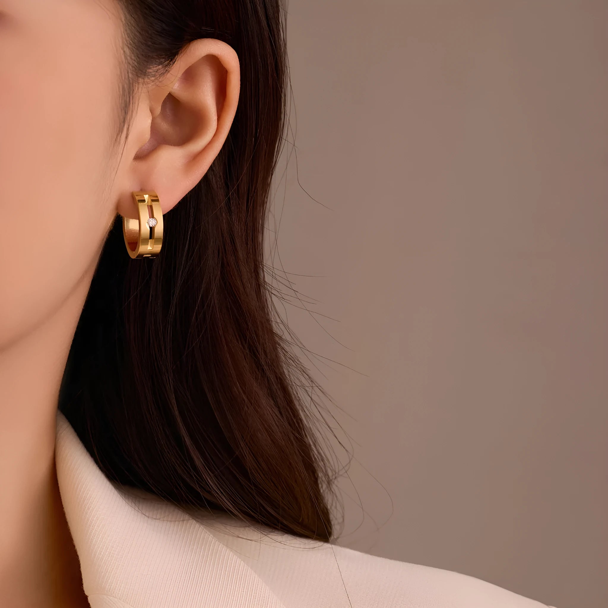Women's geometric stainless steel drop earrings with 18K gold electroplating in golden finish