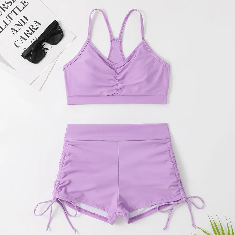 Women's high waisted split bikini swimsuit in black or violet colours