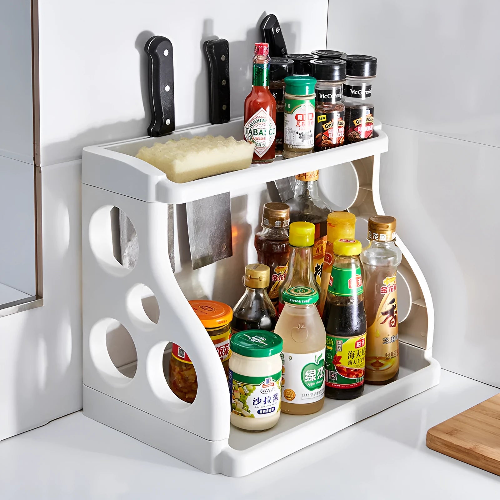 Foldable pink PP kitchen storage shelving unit with multiple tiers for organisation.