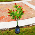 LED solar Christmas tree ground lamp with 15-color LED, 70cm tall, plastic and stainless steel construction, purple or red options