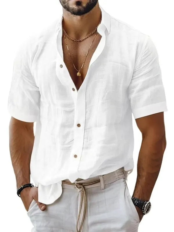 Men's solid colour short sleeve lapel shirt in light green shown on a hanger