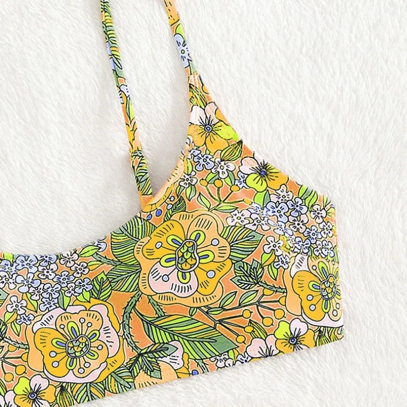 Women's printed two-piece bikini set in polyester, sleeveless sling top and briefs bottom, peacock blue or lemon yellow, sizes S M L