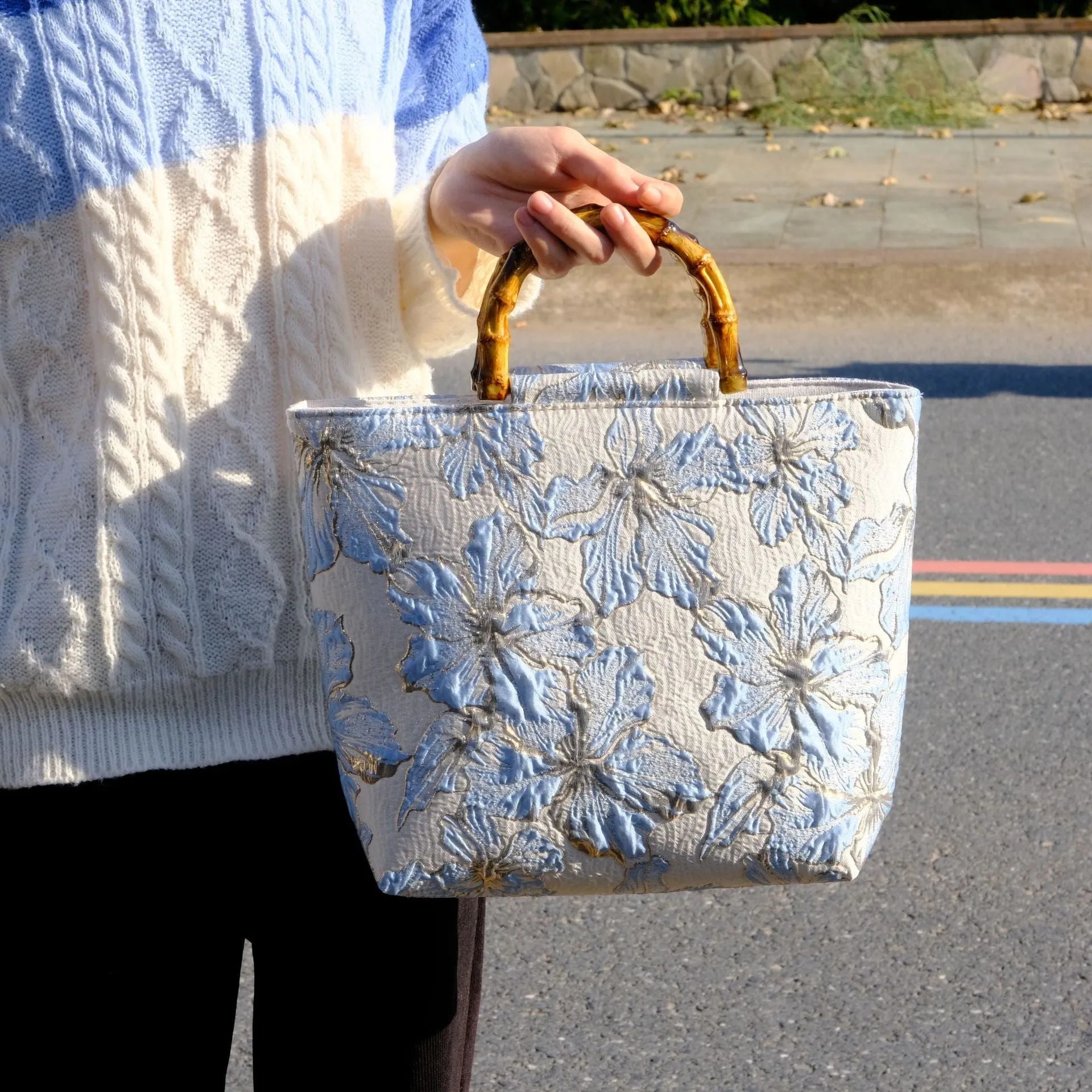 Light blue women's canvas shoulder bag with bronzing flower decorations measuring 30x30x10cm