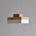 Wooden fish line chandelier with adjustable drop and matte black or white round or square finish.